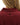 Waggle W patch on the back of the Garnet Ridgeline polo on a model in front of a white background