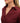 Collar of the Garnet Ridgeline Polo on a model in front of a white background