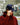 Taylor Heise wearing her Gold Hat on the ice rink.