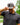 Squatch Hat on a male model with greenery in the background