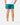 Back of the Green Lakers Shoreline Short on a model in front of a light gray background.