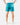 Back of the Green Lakers Shoreline Short on a model in front of a light gray background.