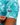  Waggle Logo on the left sleeve of the Hawaiian Punchout Polo on a male model in front of a white background