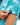 Waggle W logo on the left sleeve of the Hawaiian Punchout Polo on a model in front of a white background