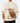 Back of the Highlander Wildknit Sweater on a Male Model in front of a light gray background.