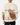 Back of the Highlander Wildknit Sweater on a Male Model in front of a light gray background.