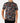 Untucked Front of the Into The Wild Polo on a model in front of a light gray background.