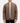 Front of the Iron Range Crosscut Bomber Jacket unzipped on a model in front of a light gray background