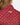 Close up on the back Waggle Logo on the Lady Luck Refresh Q-Zip on a model in front of the light gray background.