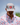Model wearing the Lobstah Hat on the golf course with blue sky in the background
