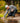 Model wearing the Loon Lake Flannel outside looking for skipping rocks in a river