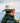 Model wearing the Mechanics Wool Brim Hat outside with a lake and blue sky in the background.