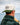 Model wearing the Mechanics Wool Brim Hat outside with a lake and blue sky in the background.