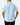 Back of the Migration Outpost Button-Down Shirt on a model in front of a light gray background.