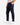 Front 3/4 of the Navy Ace Pants on a model in front of a white background