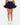 Model showing the Flair of the skort in front of a light gray background