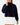 Front of the Navy Plume Funnel Neck on a model in front of a light gray background.