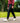 Model wearing the Rhythm Pants outside with greenery in the background