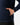 Close up on one of the front hand pockets on the Navy Sunday Quarter Zip on a model in front of a light gray background.