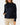 Front of the Navy Stride Jacket on a model in front of a light gray background.