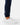 Close up on the ankle cuffs on the Navy Core Sweatpants on a model in front of a light gray background.