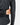 Close up on the perforated under sleeves on the Nightshade Refresh Q-Zip on a model in front of the light gray background.