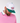 Front of the Azaleas Hat on a model in front of a grey background