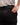 Close up on the Magnetic pocket on the back right side of the Ace Pants on a model in front of a white background