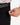 Close up on the Zippered pocket on the left leg of the Ace Pants on a model in front of a white background