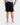 Back of the Boy's Scramble Short on a model in front of a light gray background.