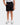 Front of the Boy's Scramble Short on a model in front of a light gray background.