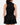 Back of the Black Matchplay Mock Neck on a model in front of a light gray background.