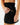Close up on the tee loop featured on the left side of the Pacesetter Skort on a model in front of a light gray background.
