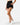Front 3/4 of the Onyx Momentum Shorts on a model in front of a light gray background.