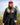 Female Model wearing the Onyx Plume Funnel Neck Sweatshirt outside with greenery & sky in the background
