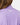 Close up on the back Waggle Logo on the Perennial Refresh Q-Zip on a model in front of the light gray background.