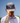 Model wearing the Range Rat Hat on the Golf Course with Blue sky in the background