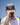 Model wearing the Range Rat Hat on the Golf Course with Blue sky in the background