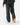 Back of the Savanna Lounge Day Sweatpants on a model in front of a light gray background.