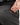 Close up on the Magnetic pocket on the back right side of the Ace Pants on a model in front of a white background