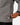 Close up on the Zippered Hand Pockets on the Smoke Playmaker Jacket on a model in front of a light gray background.
