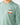 Close up on the front graphic on the S'More Season Youth T-Shirt on a Boy Model in front of a light gray background.
