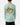 Back of the S'more Season Youth T-Shirt on a Girl Model in front of a light gray background.