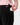 Close up on headphones being pulled out of the right rear zippered pocket on the Speckled Onyx Momentum Shorts on a model in front of a light gray background.