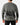 Back of the Squatch Wildknit Sweater on a Male Model in front of a light gray background.