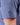 Waggle Logo Embroidered on the right sleeve of the Steel Blue T-Shirt on a Male Model in front of a white background