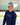 Female model wearing the Sticks in the Middle Long Sleeve T-Shirt skating on a hockey rink