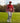 Model wearing the Sundown Zenith Zip Hoodie on the golf course with fairway and trees in the background