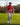 Model wearing the Sundown Zenith Zip Hoodie on the golf course with fairway and trees in the background