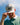 Jake Oettinger wearing the Super Fly Hat doing a hat tilt with blue sky in the background.